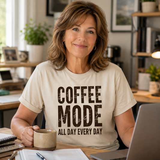 Woman wearing Coffee Mode All Day Every Day natural t-shirt in home office